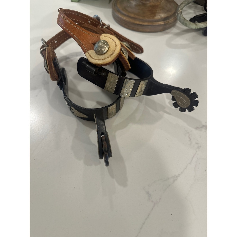 Western Steel Spurs with Engraved Silver Overlays and Leather Straps